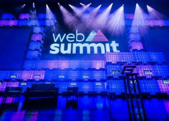 a stage that has some chairs on it